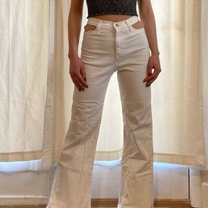 Adika white cutout jeans with flared leg. Size small!